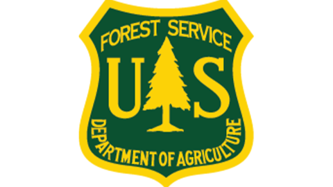 Un logotipo digital para el Servicio Forestal de Estados Unidos, dependiente del Departamento de Agricultura; el logotipo tiene forma de insignia.
